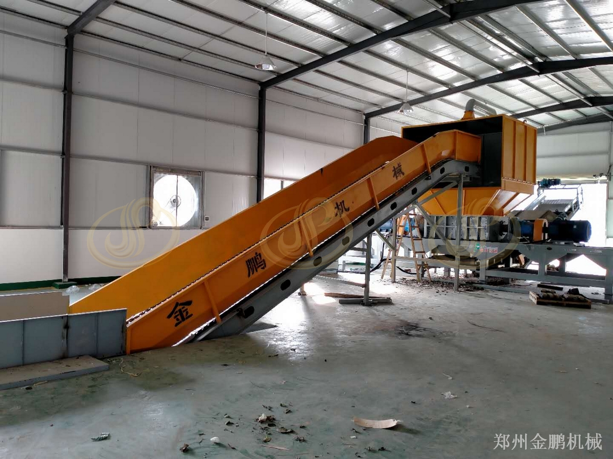郑州金鹏大件废弃物撕碎机在工业固废处理中的应用