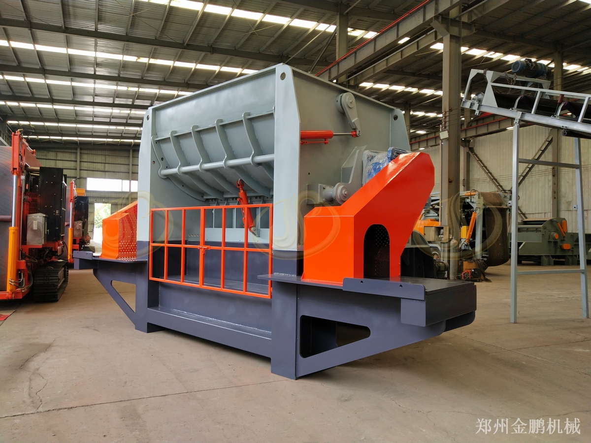 郑州金鹏工厂废料撕碎机在工业固废预处理中的应用